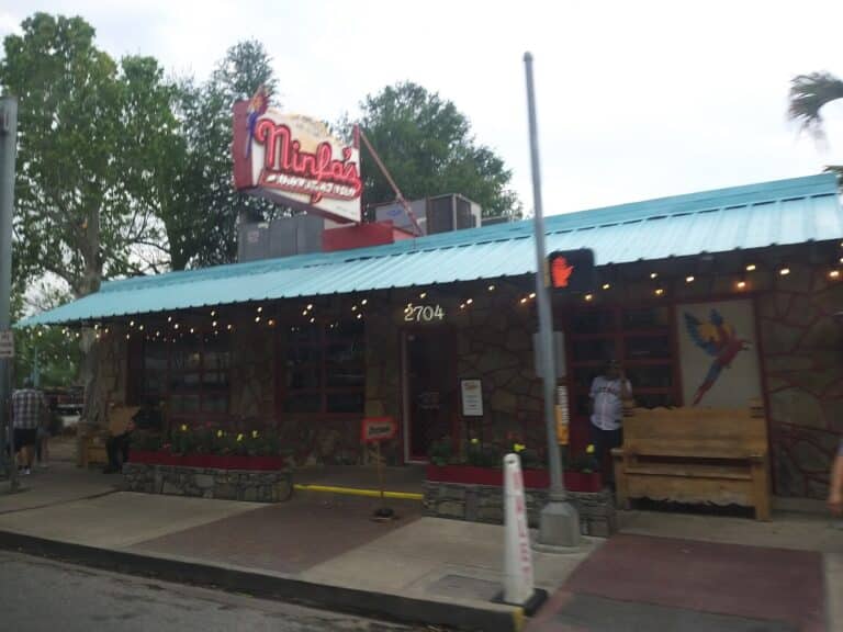 The front of The Original Ninfa's restaurant on Navigation Boulevard in Houston's East End, with its red sign and green awning