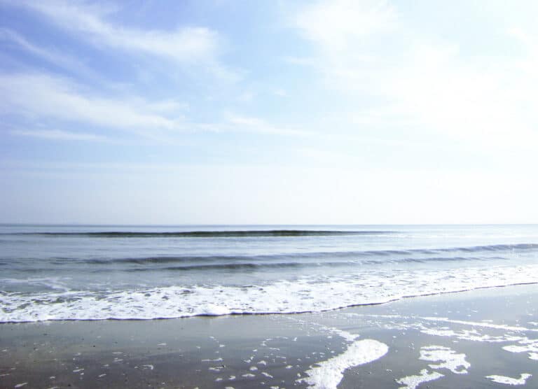 Gulf of Mexico waves rolling onto the sand at Crystal Beach on the Bolivar Peninsula, Texas