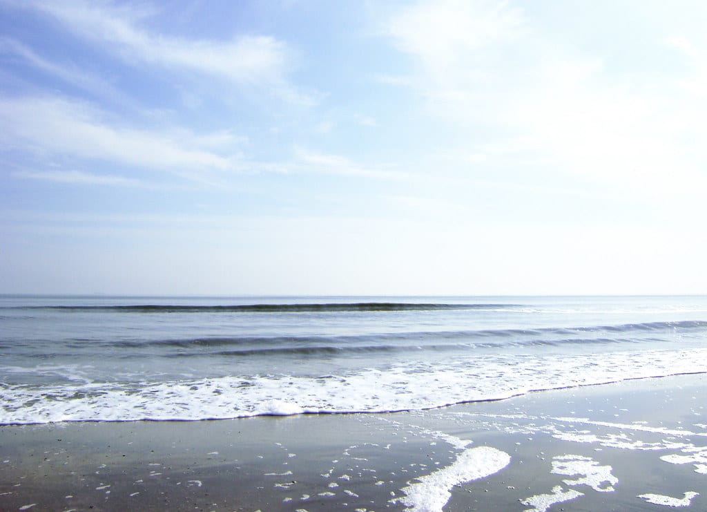 Gulf of Mexico waves rolling onto the sand at Crystal Beach on the Bolivar Peninsula, Texas